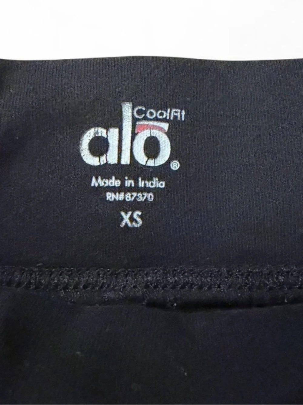 Alo Yoga XS black high-waisted flair leggings with elastic waistband